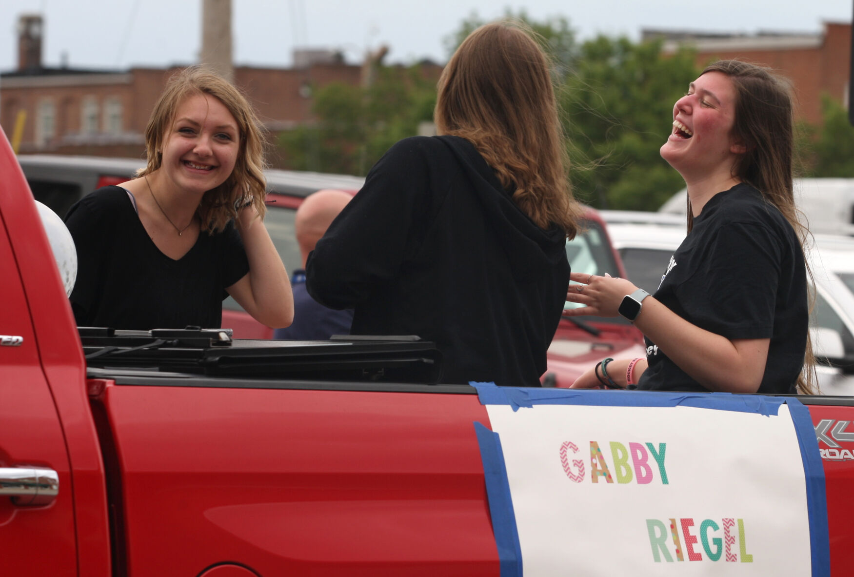 Kira, Gabby and Maddie laugh